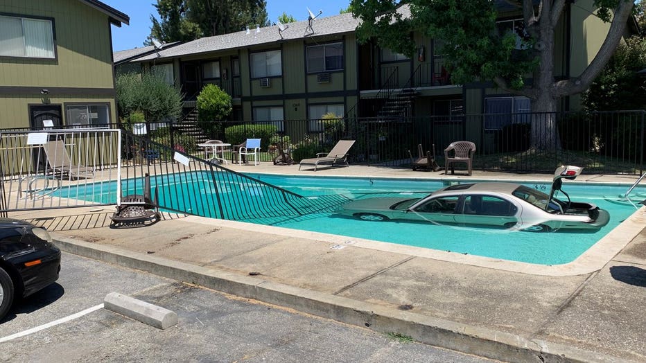 Driver OK after vehicle goes into pool at San Jose complex