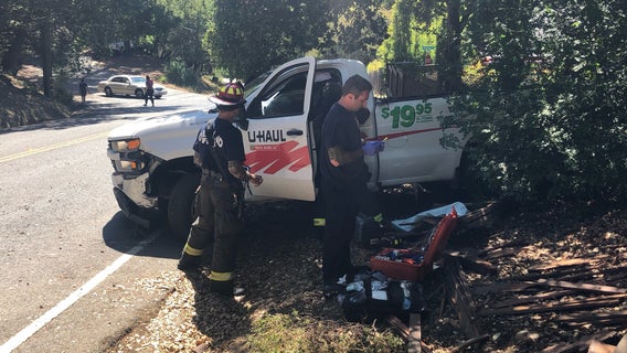 U-Haul truck driver crashes into hydrant, damages fence in Oakland