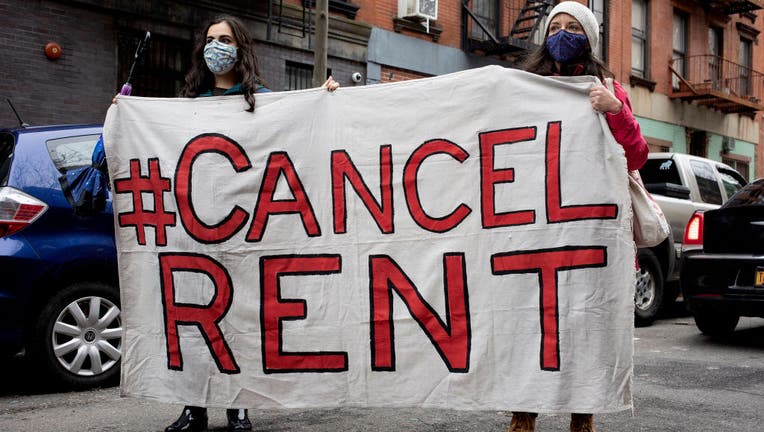 Tenant rights activists hold a demonstration outside the home of New York State Senator Brian Kavanagh to protest what they claim to be inadequate legislative relief for renters during the COVID-19 pandemic and to call for the cancellation of rent, February 28, 2021 in the East Village neighborhood of New York City. (Photo by Andrew Lichtenstein/Corbis via Getty Images)