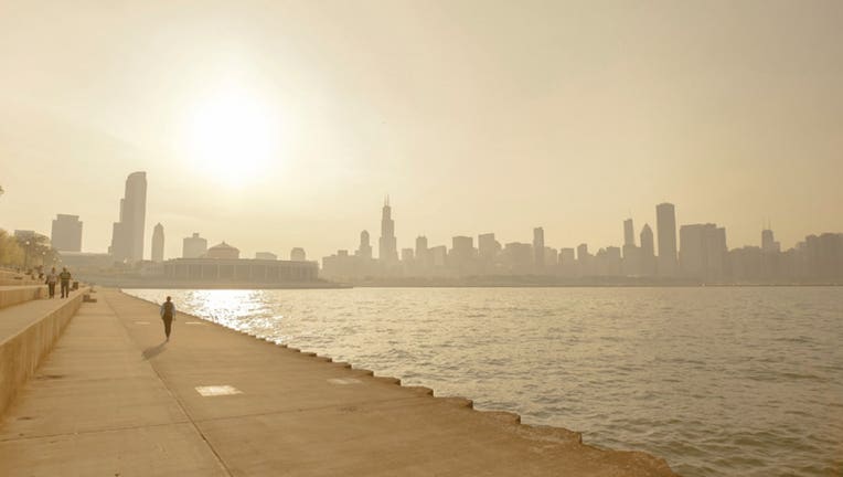 This FILE photo shows smog on the shoreline of Chicago during a summer heat wave.