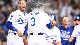 Taylor hits walk-off HR, Dodgers deck Cards 3-1 in WC game