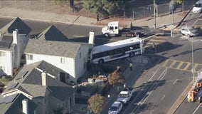 Stolen vehicle pursuit ends with AC Transit bus crashing into Oakland home