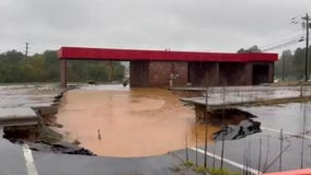 Heavy rain in North Carolina floods mountain areas, fills massive sinkhole