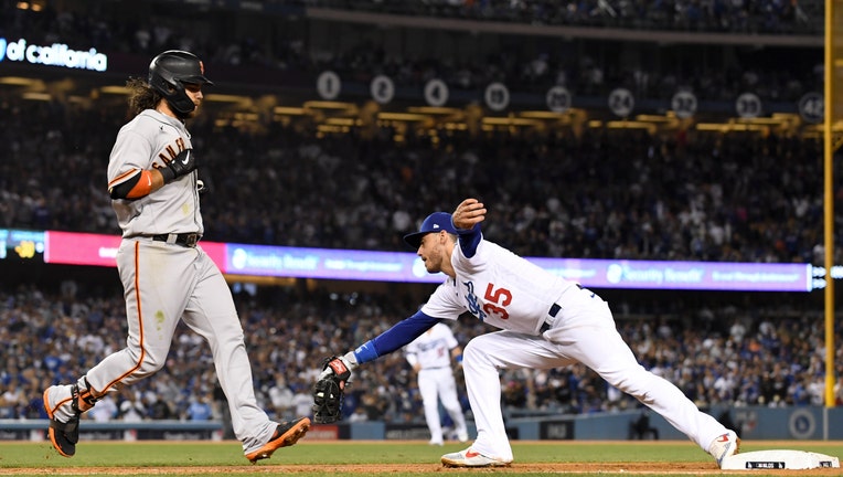 Dodgers beat Giants 7-2, force decisive Game 5 in NLDS