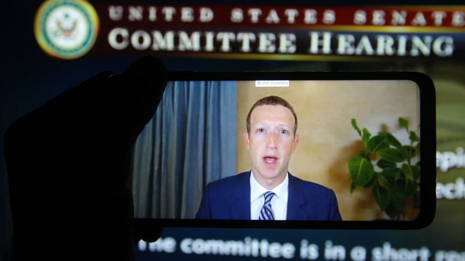In this photo illustration, Facebook CEO Mark Zuckerberg