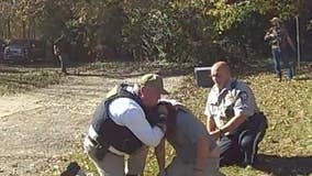 Georgia sheriff talks man into putting down his gun, comforts him