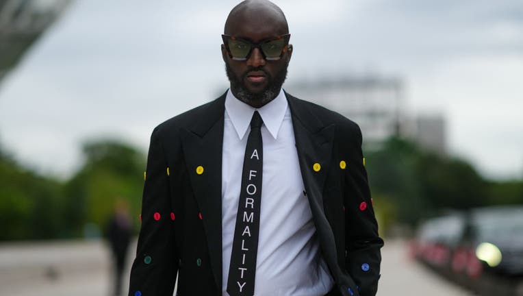 Street Style - Paris Fashion Week - Haute Couture Fall/Winter 2021/2022 : Day One