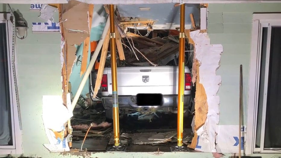 PICKUP TRUCK COMPLETELY CRASHES INTO HOME