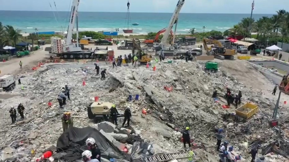 Storyful-256562-Rescue_Teams_Search_Newly_Demolished_Area_of_Surfside_Condo.mp4_.00_02_02_18.Still001.jpg