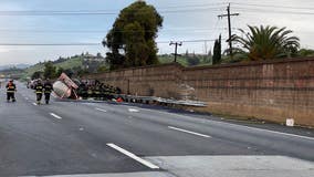 Tanker truck tips over on Fremont highway, spills gasoline