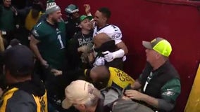 Eagles fans fall onto field while cheering on Hurts
