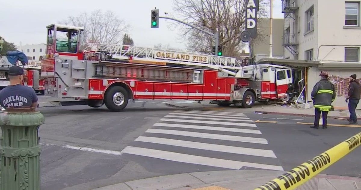 Oakland firetruck slams into building to avoid car; firefighters taken ...