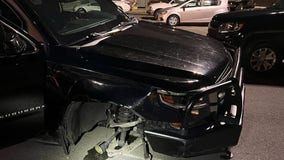 Oakland police cruiser damaged by armed suspects, police say