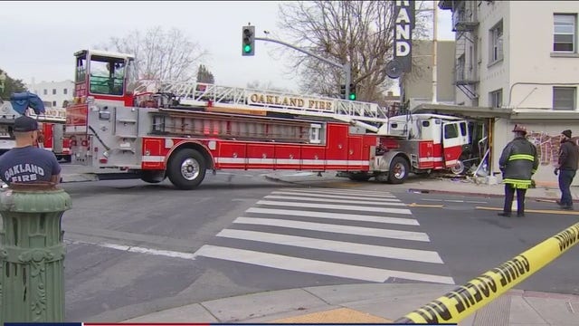 Oakland firetruck slams into building to avoid car; firefighters taken to hospital