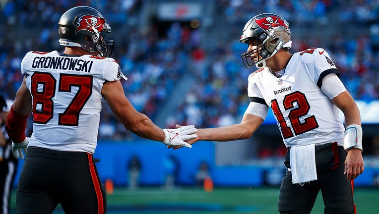 Tom Brady of the Tampa Bay Buccaneers yells as he runs on the field News  Photo - Getty Images