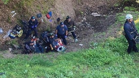 Oakland firefighters rescue 2 people who fell from roof into steep ravine