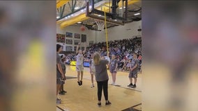 Blind basketball player makes shot in front of 2,500 fans
