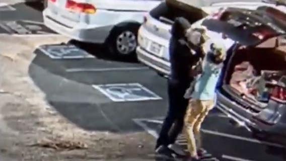 Woman robbed while unloading groceries from car in Oakland