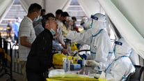 Beijing enforces lockdowns, expands COVID-19 mass testing amid outbreak