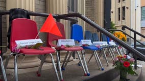 Empty school chairs line Alameda street in memorial honoring Uvalde shooting victims