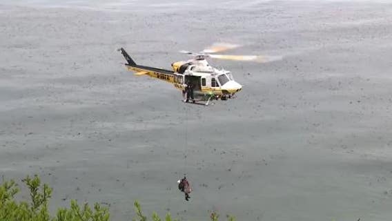 1 found dead, 3 injured on beach below California cliff