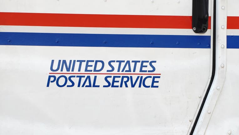 USPS sign on delivery truck in Flushing, Queens. 
USPS