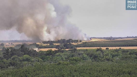 Firefighters working to contain vegetation fire in Vacaville
