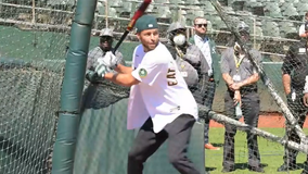 Steph Curry takes a crack at baseball, visits Oakland A's facility to give back