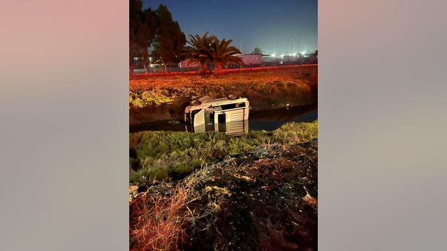 Oakland firefighters rescue man who drove into canal near Coliseum
