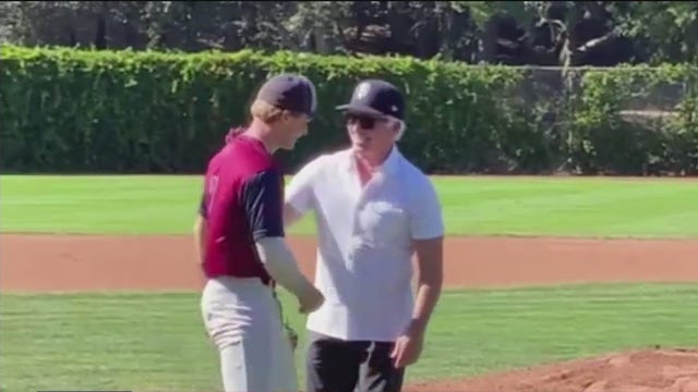 Mark Ibanez throws ceremonial first pitch at Borman Field