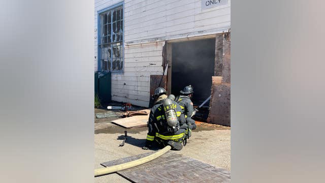 Oakland firefighters providing mutual aid to structure fire on Alameda Point