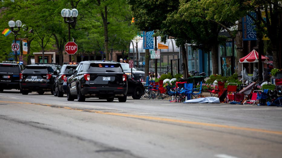 HIGHLAND PARK, IL - JULY 04: First responders work the scene of a shooting at a Fourth of July parade on July 4, 2022 in Highland Park, Illinois. (Photo by Jim Vondruska/Getty Images)