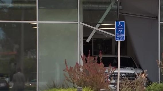 Truck crashes into San Jose business building