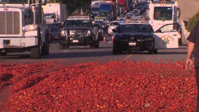Sac-a-tomato! Truck carrying tomato load overturns on I-80