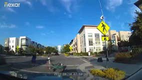 SUV nearly hits young girl on scooter in marked crosswalk in San Mateo