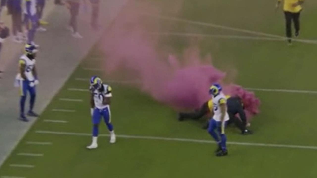 Protesters interrupt NFL's Bills-Rams season-opener with pink