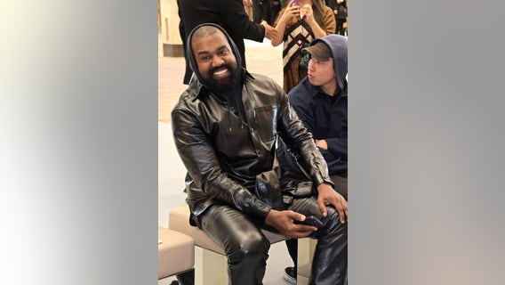Kanye West wearing White Lives Matter shirt during his Yeezy show in Paris