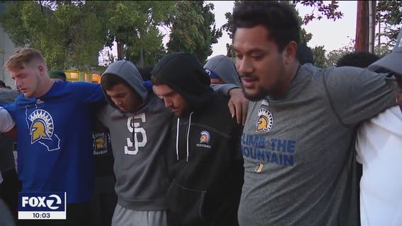 San Jose State football players, students gather for vigil after freshman is hit and killed by bus