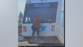 Person seen dangerously clinging to VTA light rail as it speeds along track