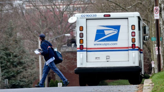 Berkeley postal workers navigate rain, holiday rush to deliver Christmas cheer