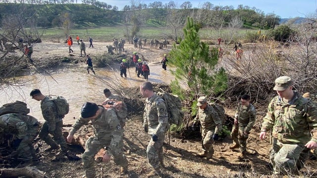 California storms: National Guard joins search for missing boy swept away in flood