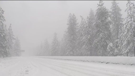 Blizzard conditions force highway closures in the Sierra Nevada