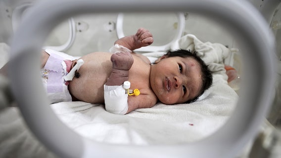 Gunmen storm hospital of newborn saved from quake in Syria