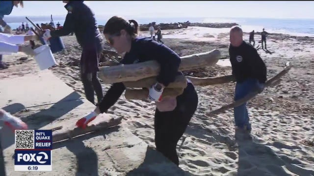 Storm-damaged community energized as Capitola Village hosts beach clean-up