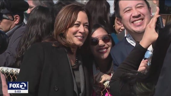 Vice President Kamala Harris talks with small business owners in San Francisco's Chinatown