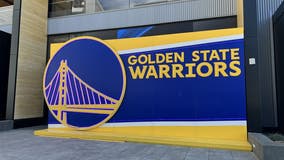 Warriors game postponed after assistant coach suffers medical emergency