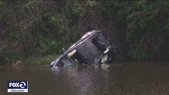 Investigators hope Tesla pulled from Peninsula lagoon yields clues in double fatal crash