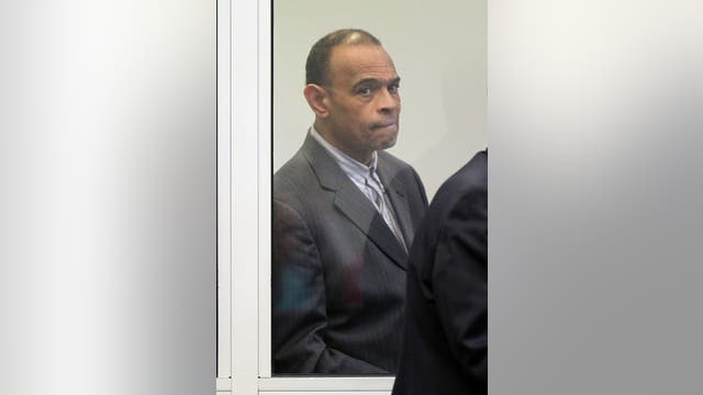 School dean who shot student sentenced for racketeering