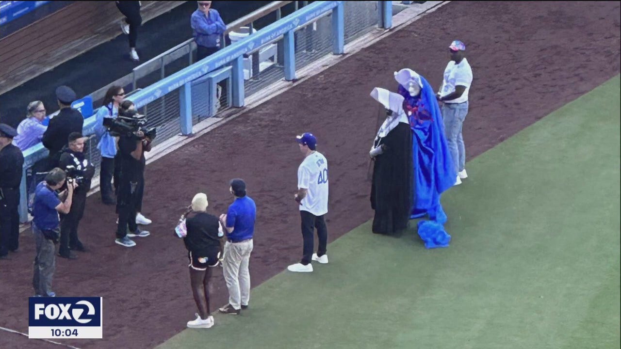 Catholic and other religious protesters gather at Dodger Stadium