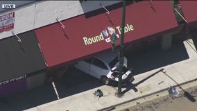 Vehicle smashes into Hayward pizza shop after road-rage shooting: police